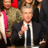 Legislators surround California Gov. Gavin Newsom Wednesday as he signs a bill giving $90 million to Planned Parenthood, Feb. 11, 2026. Photo: Madeline Shannon / The Center Square.