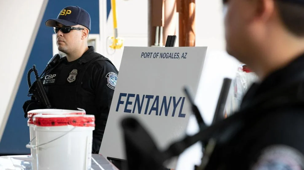 CBP officers stand near seized fentanyl at the Port of Nogales in Ariz., on Jan. 26, 2019. Photo: Jerry Glaser / U.S. Customs and Border Protection via DVIDS / Public Domain